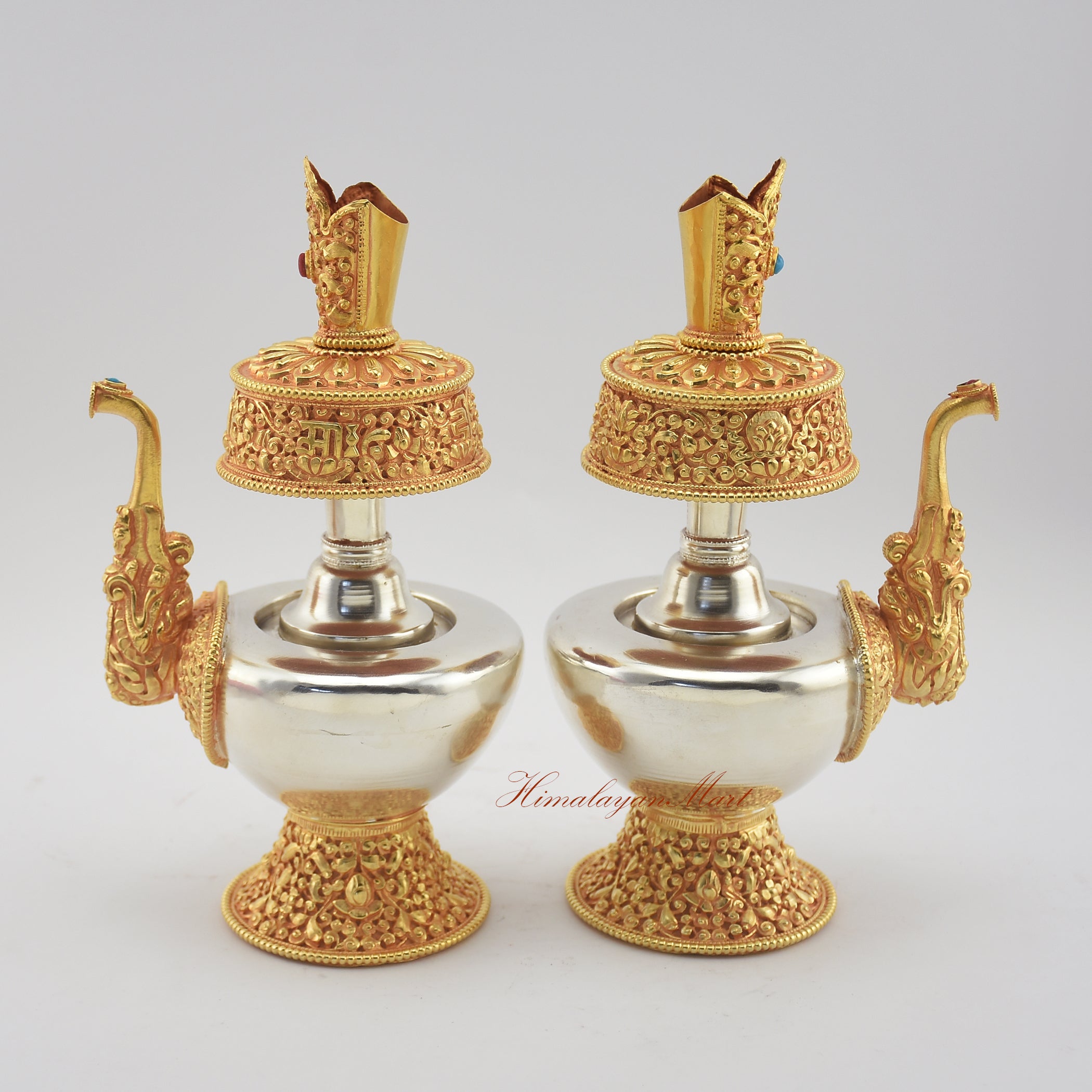 Angled view of Tibetan Ritual Bumpa Vase showing left and right sides with hand-applied decorations