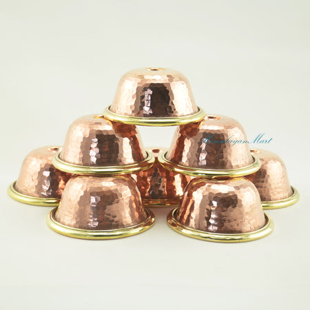 Top-down view of Tibetan Ritual Offering Bowl Set showing hand-beaten copper alloy texture and brass rim