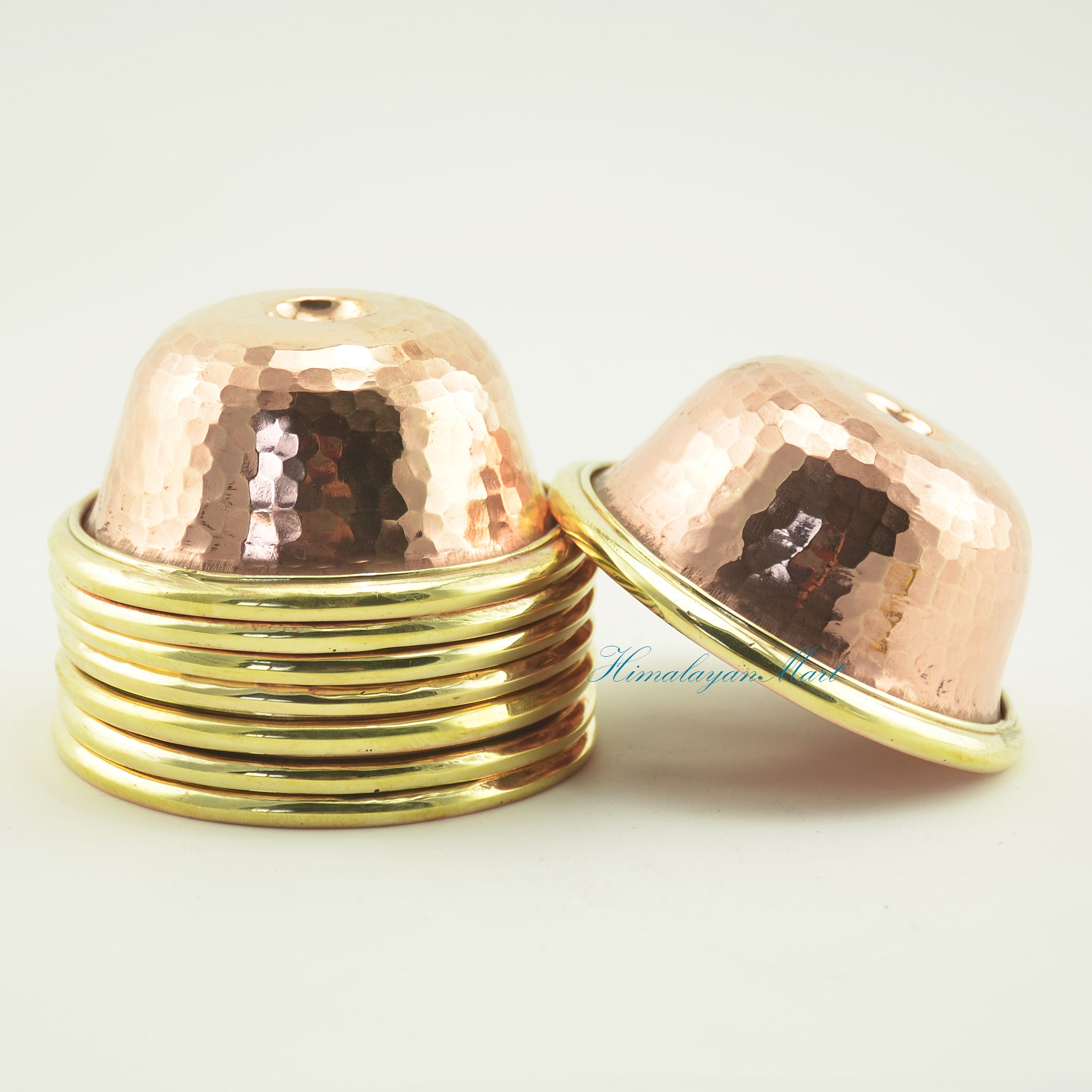 Side view of Tibetan Ritual Offering Bowl Set displaying brass rim and handcrafted copper alloy form