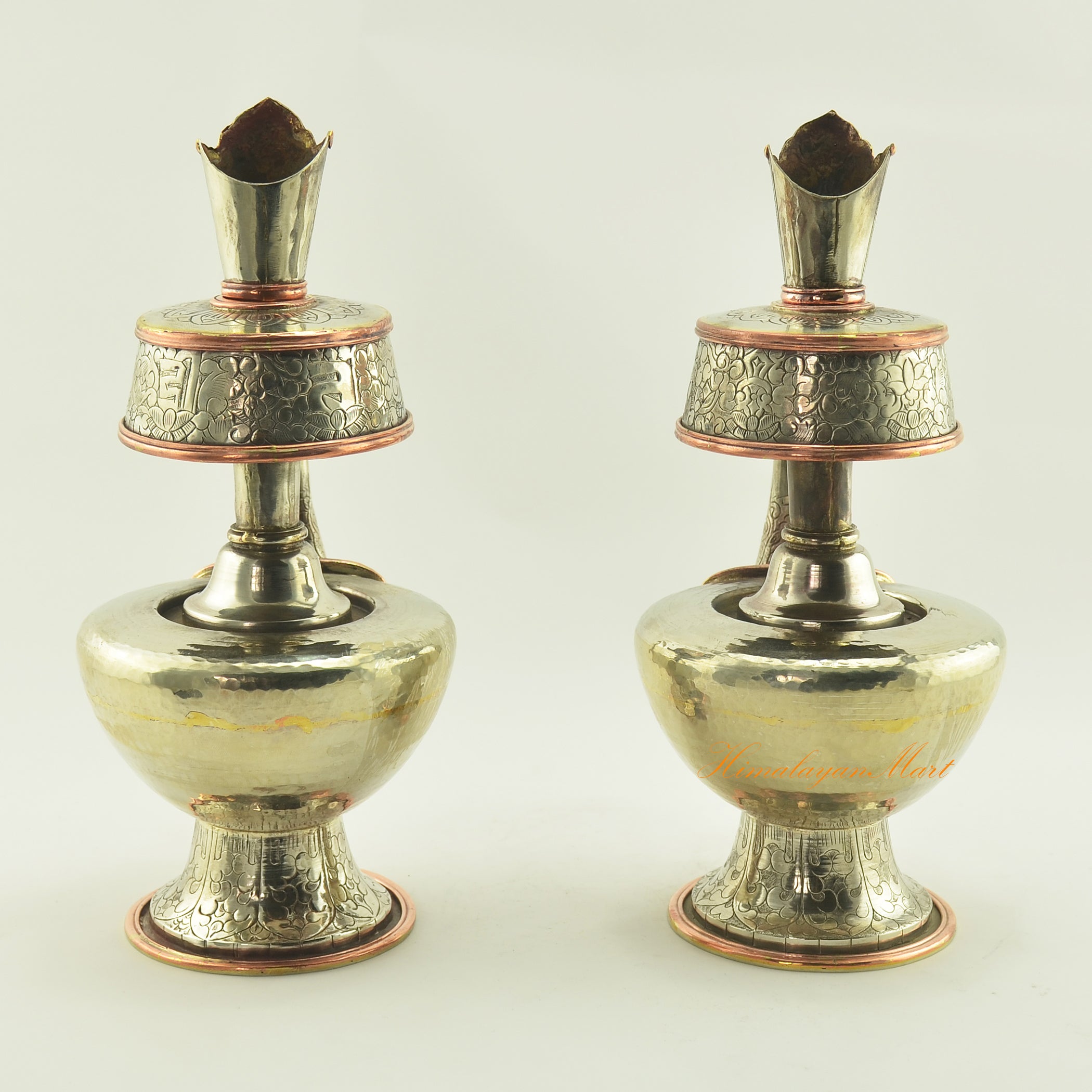 Back view of Tibetan Ritual Offerings Bhumba showing hand-carved details and copper ring accents