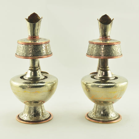 Back view of Tibetan Ritual Offerings Bhumba showing hand-carved details and copper ring accents