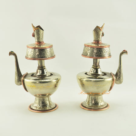 Left and right view of Tibetan Ritual Offerings Bhumba showing intricate carvings and copper ring highlights