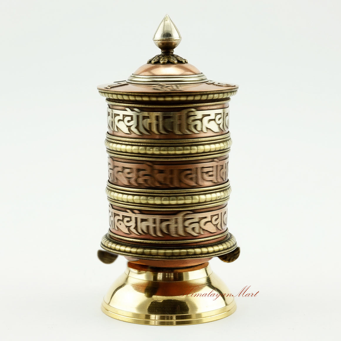 Tibetan Tabletop Prayer Wheel spinning during ritual meditation, symbolizing blessings and spiritual merit