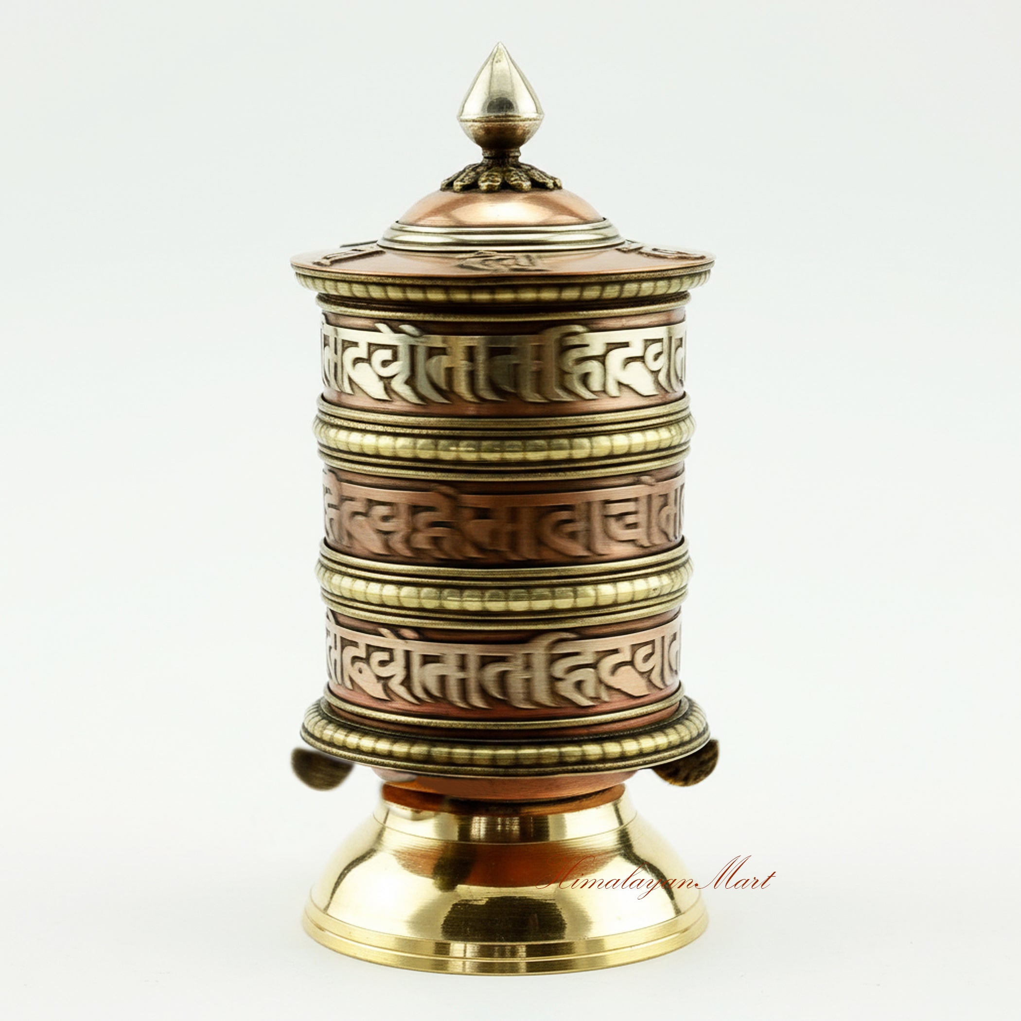 Tibetan Tabletop Prayer Wheel spinning during ritual meditation, symbolizing blessings and spiritual merit