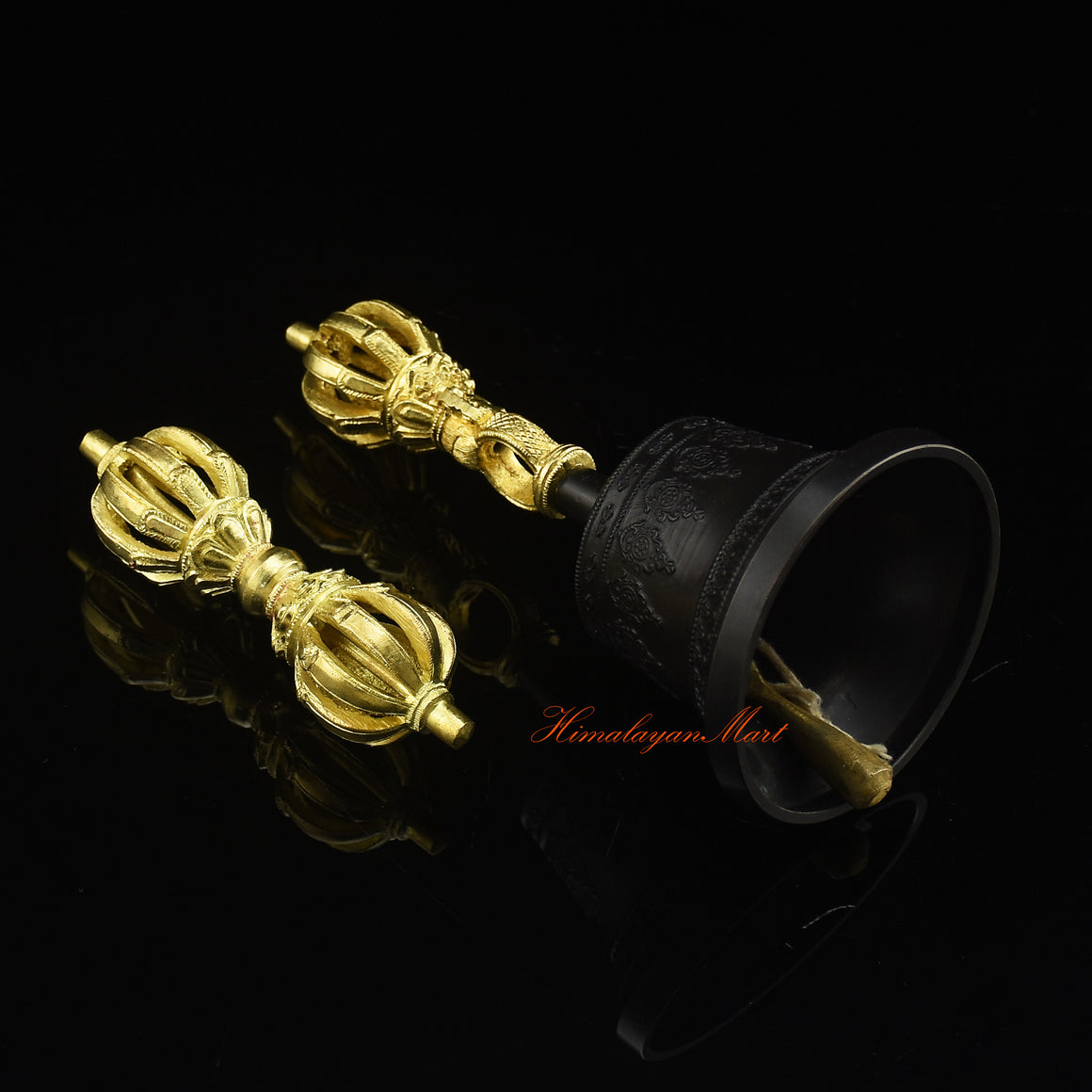 Bottom side detail of Tibetan Vajra Bell Set in Panchadhatu alloy showing base engravings and gold plating