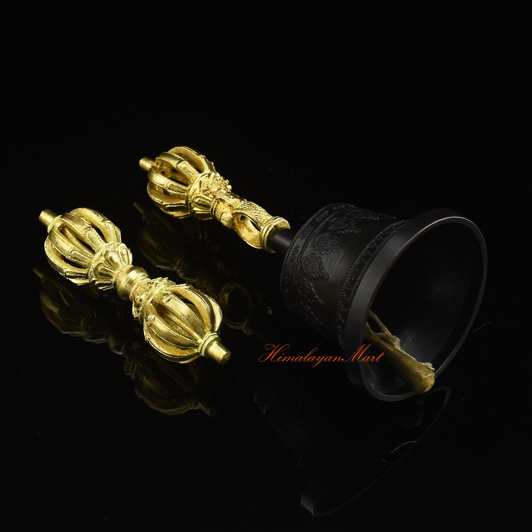 Bottom side detail of Tibetan Vajra Bell Set in Panchadhatu alloy showing base engravings and gold plating