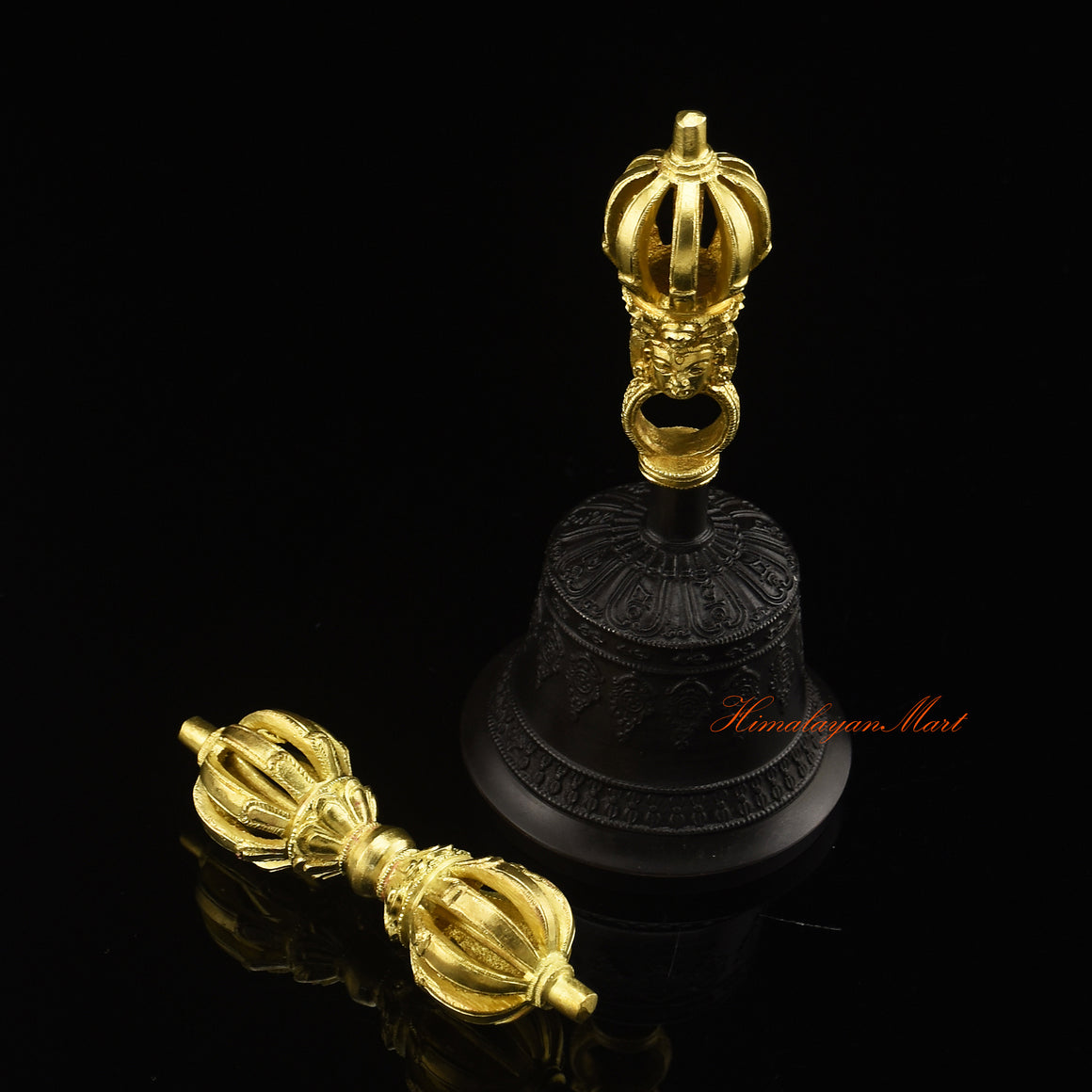 Side view of gold-plated Tibetan Vajra Bell Set showing traditional engravings and Panchadhatu alloy finish