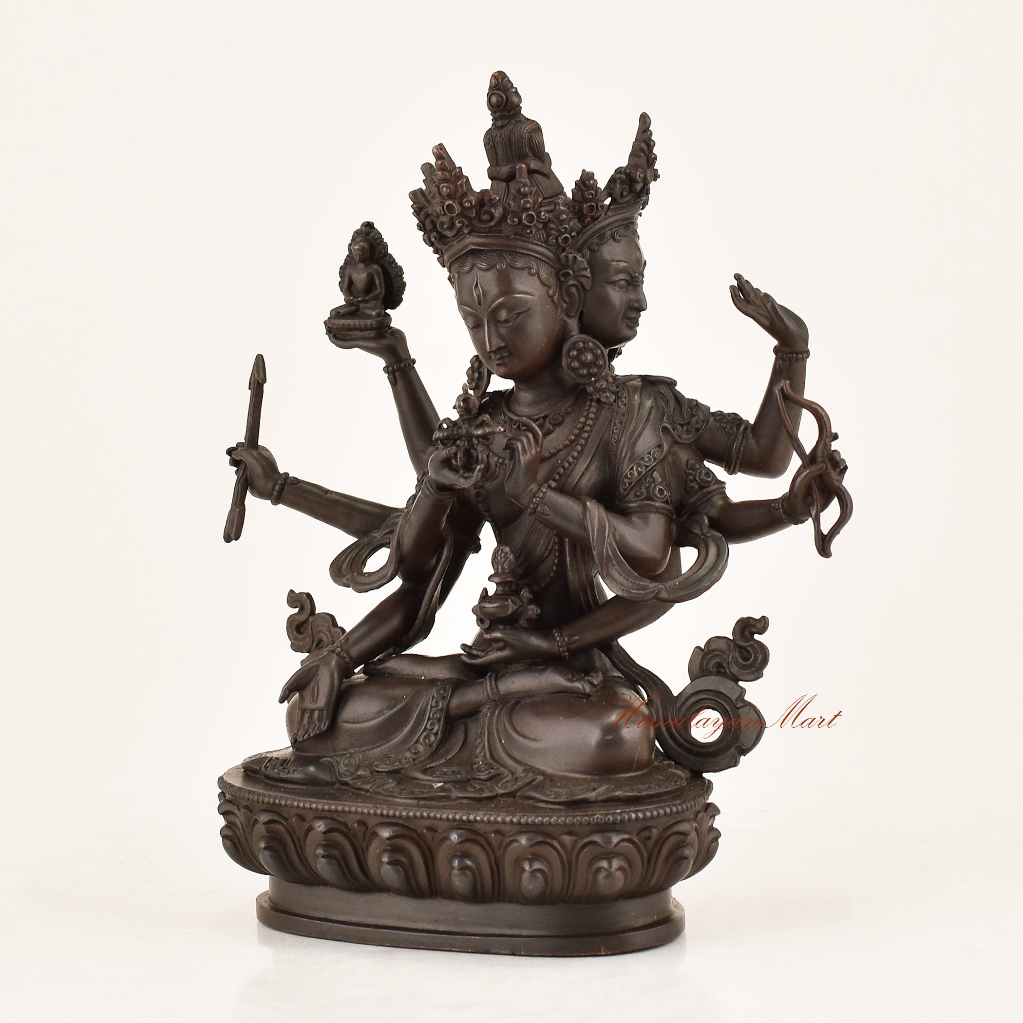Left side view of the Ushnishavijaya Statue revealing intricate copper alloy craftsmanship, armlet adornments, and lotus throne detailing by Nepali master artisans