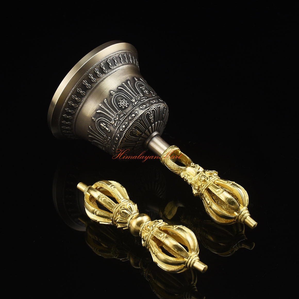 Elevated side view of gold-plated Vajra and Bell Set showing five sacred metal alloy craftsmanship Nepal
