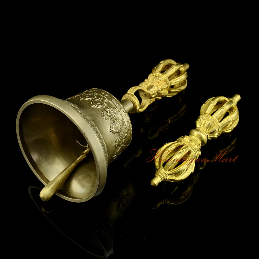 Vajra and Ghanta Set with golden-brown yellow patina bell and bronze copper vajra, handmade Buddhist ritual instrument, left side view showing engraved detail