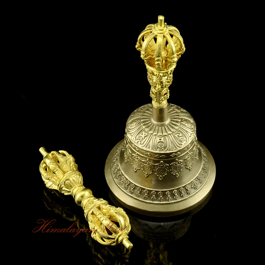 Side profile of 9-pronged vajra and golden-brown patina bell