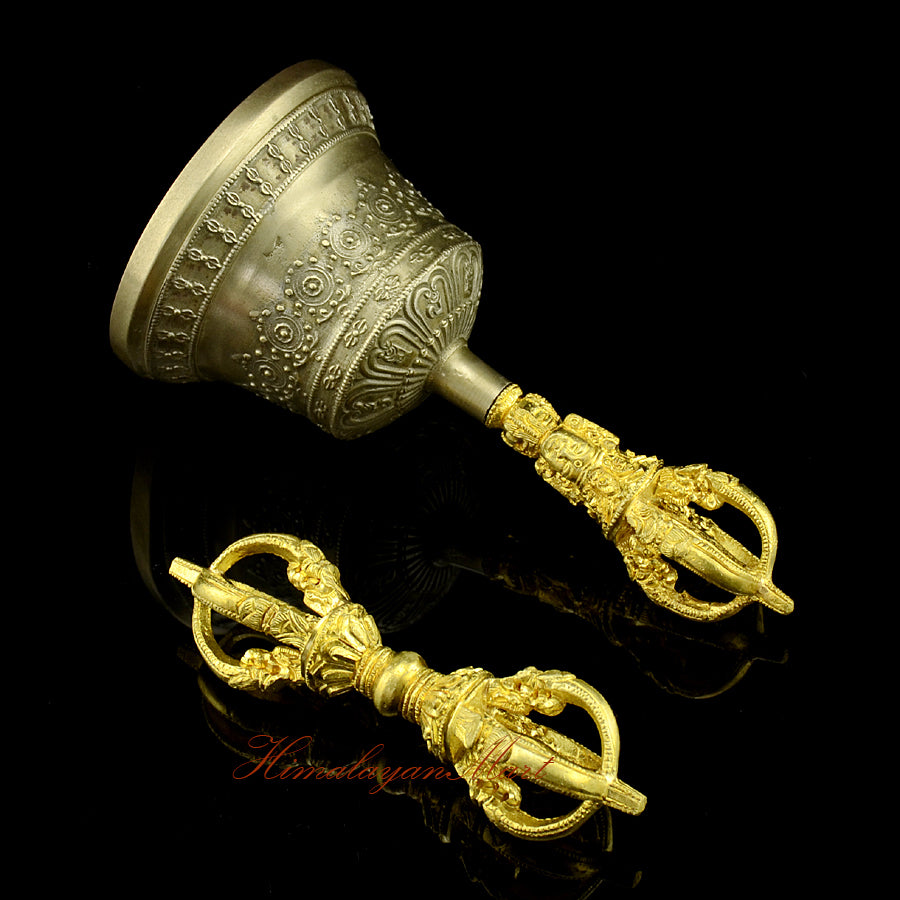 Left side view of handcrafted vajra and golden-brown bell set