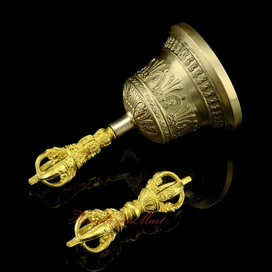 Left side view of handcrafted vajra and golden-brown bell set