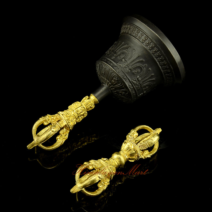 Left side view of handcrafted vajra and black patina bell set