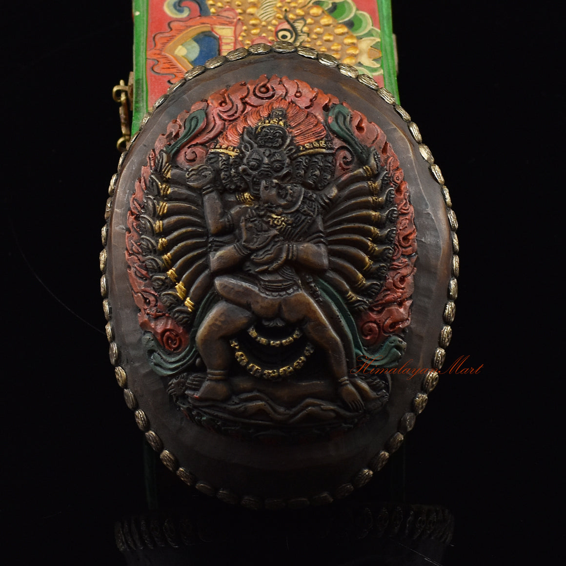 Vajrabhairava Carved Resin Kapala showing the wrathful figure in union with his consort at the center of the design