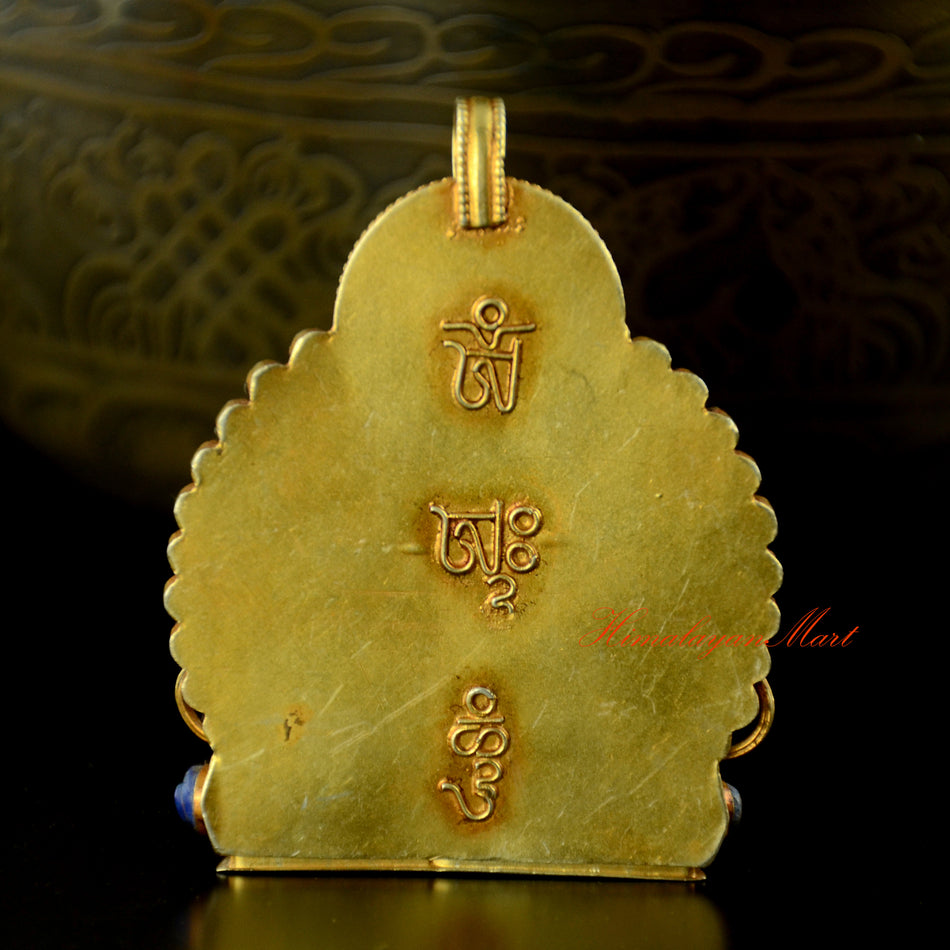 Back view of Vajrasattva Silver Pendant showing gold-plated silver craftsmanship and detailed carving