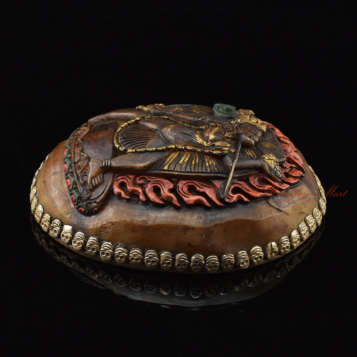 Right side view of the Vajrayogini Carved Resin Kapala showing silver-plated copper detailing