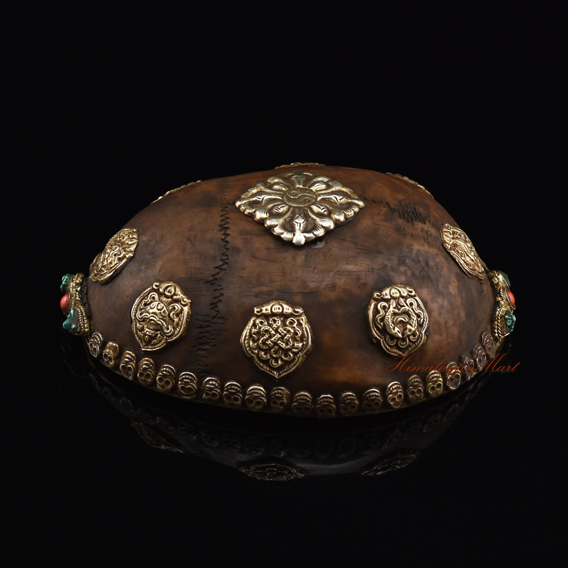 Right side view of the Viswa Vajra Resin Kapala showing the colorful stone detailing and skull border