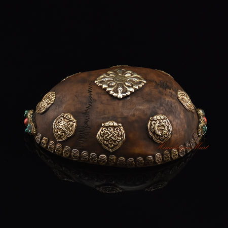 Right side view of the Viswa Vajra Resin Kapala showing the colorful stone detailing and skull border