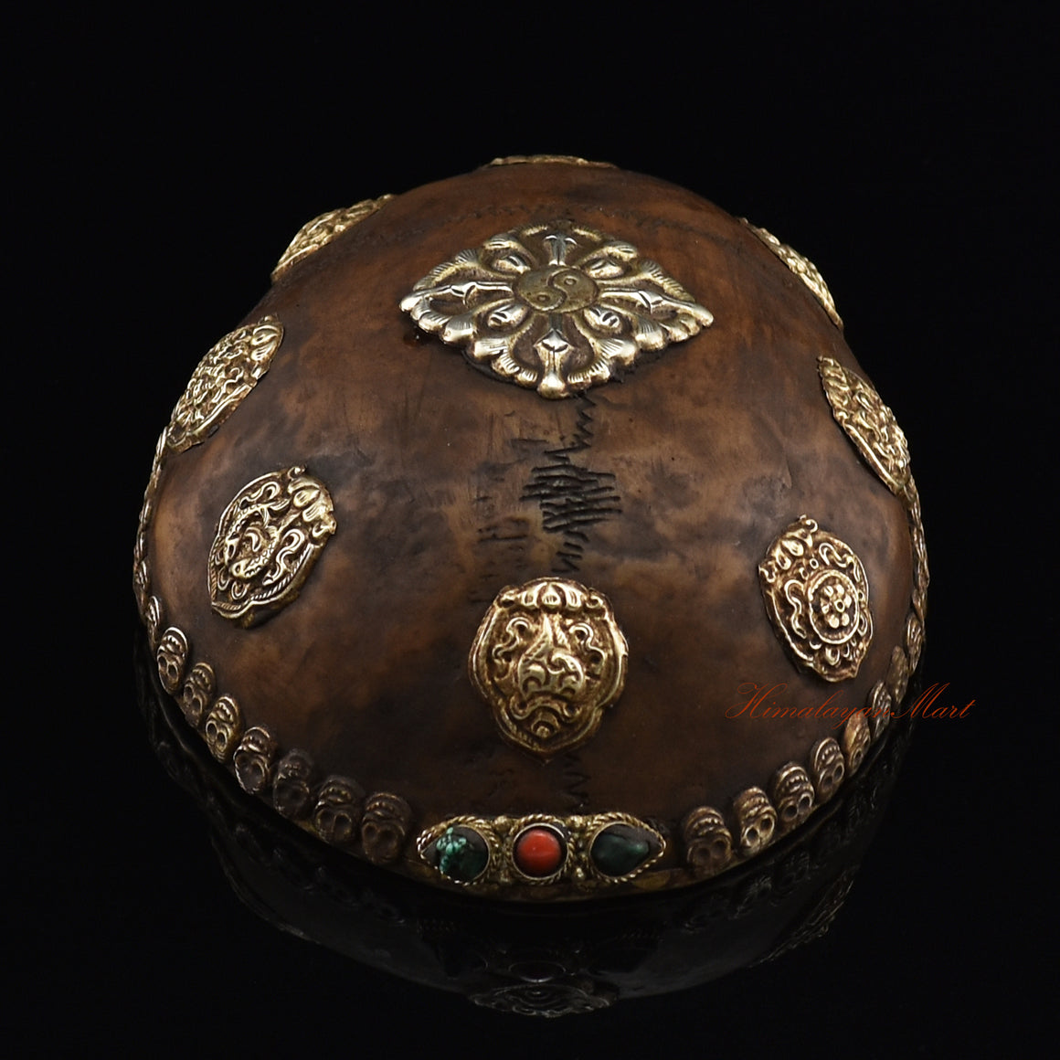 Top view of the Viswa Vajra Resin Kapala displaying the central Viswa Vajra and Eight Auspicious Symbols