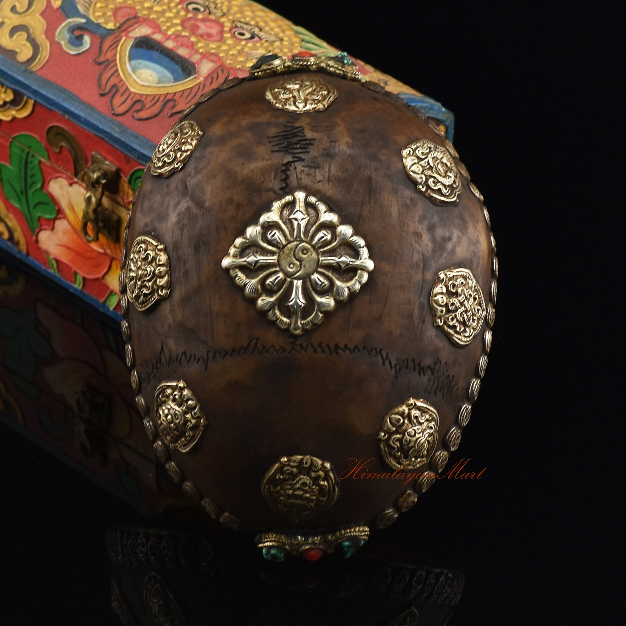 Viswa Vajra Resin Kapala with Eight Auspicious Symbols and an ornate skull border, front view