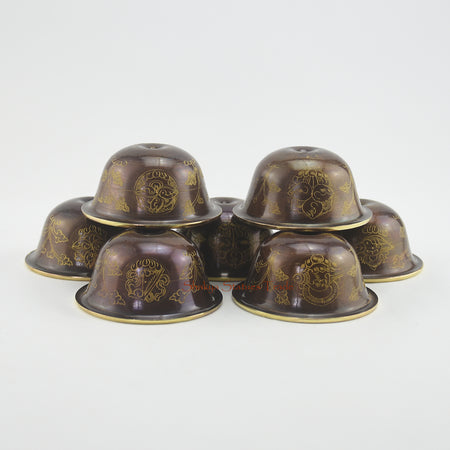 Top view of Water Offering Bowls Set showing seven gilded Tibetan Buddhist ritual bowls