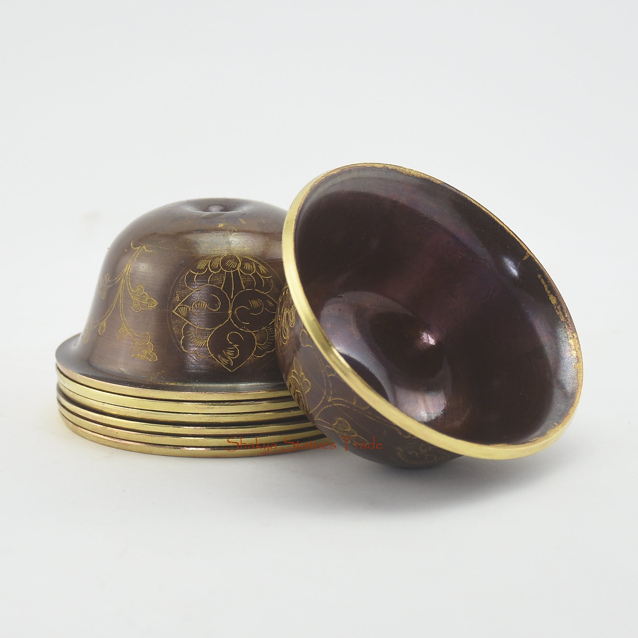 Inner view of Water Offering Bowls Set showing smooth copper surface and polished gilded interior