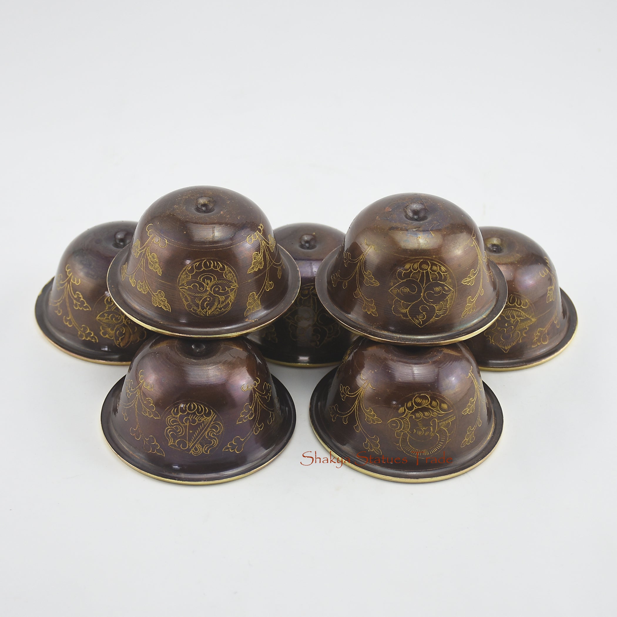 Upper angle of Water Offering Bowls Set highlighting hand-carved copper alloy details with 24k gold gilding