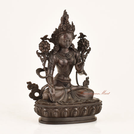 Right side view of the Bodhisattva White Tara Statue showing fine hand-carved detailing, seven eyes iconography, and oxidized antique finish crafted in Patan, Nepal