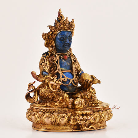 Right side view of Yellow Dzambhala lapis statue, Tibetan Buddhist wealth deity sculpture for meditation and altar use.
