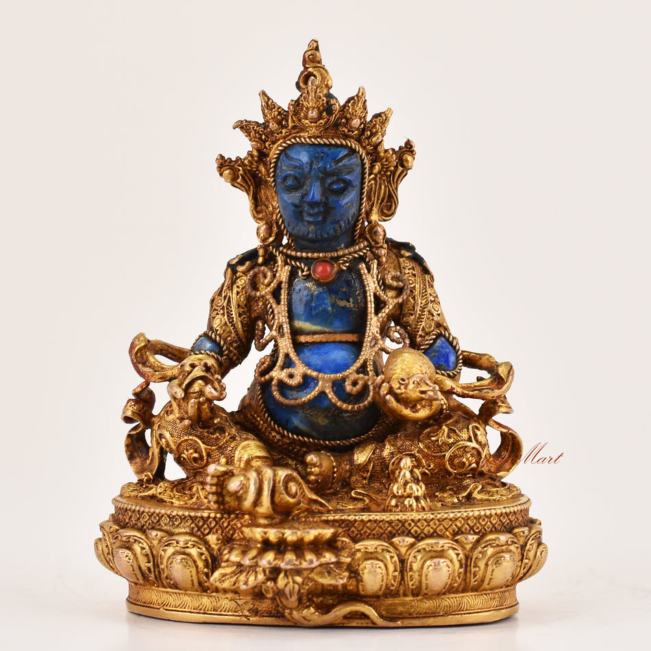 Yellow Dzambhala lapis statue depicting the Tibetan Buddhist wealth deity, handcrafted for meditation and altar spaces, front view.