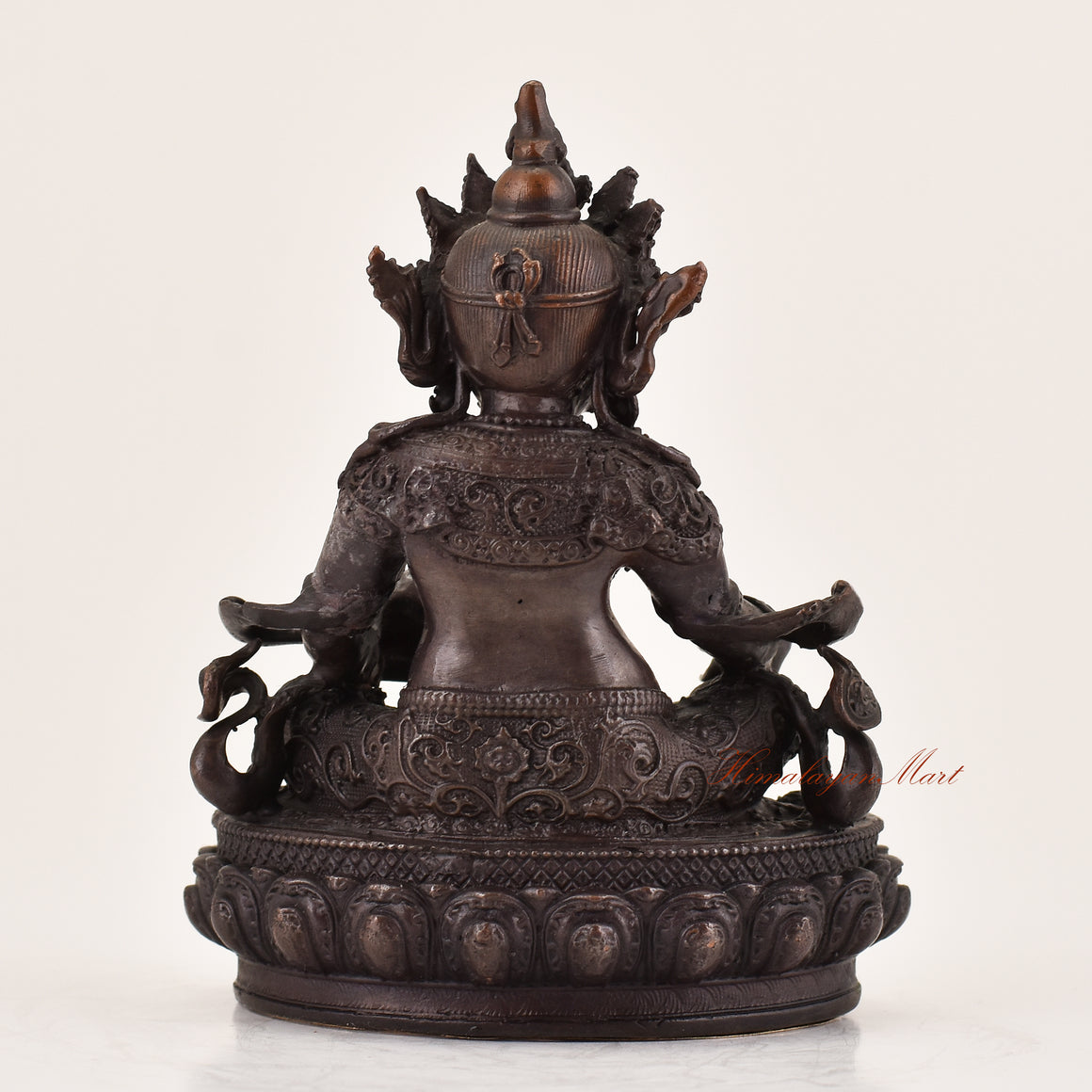 Back view of handcrafted Yellow Dzambhala statue for sale, Tibetan Buddhist wealth deity altar sculpture.