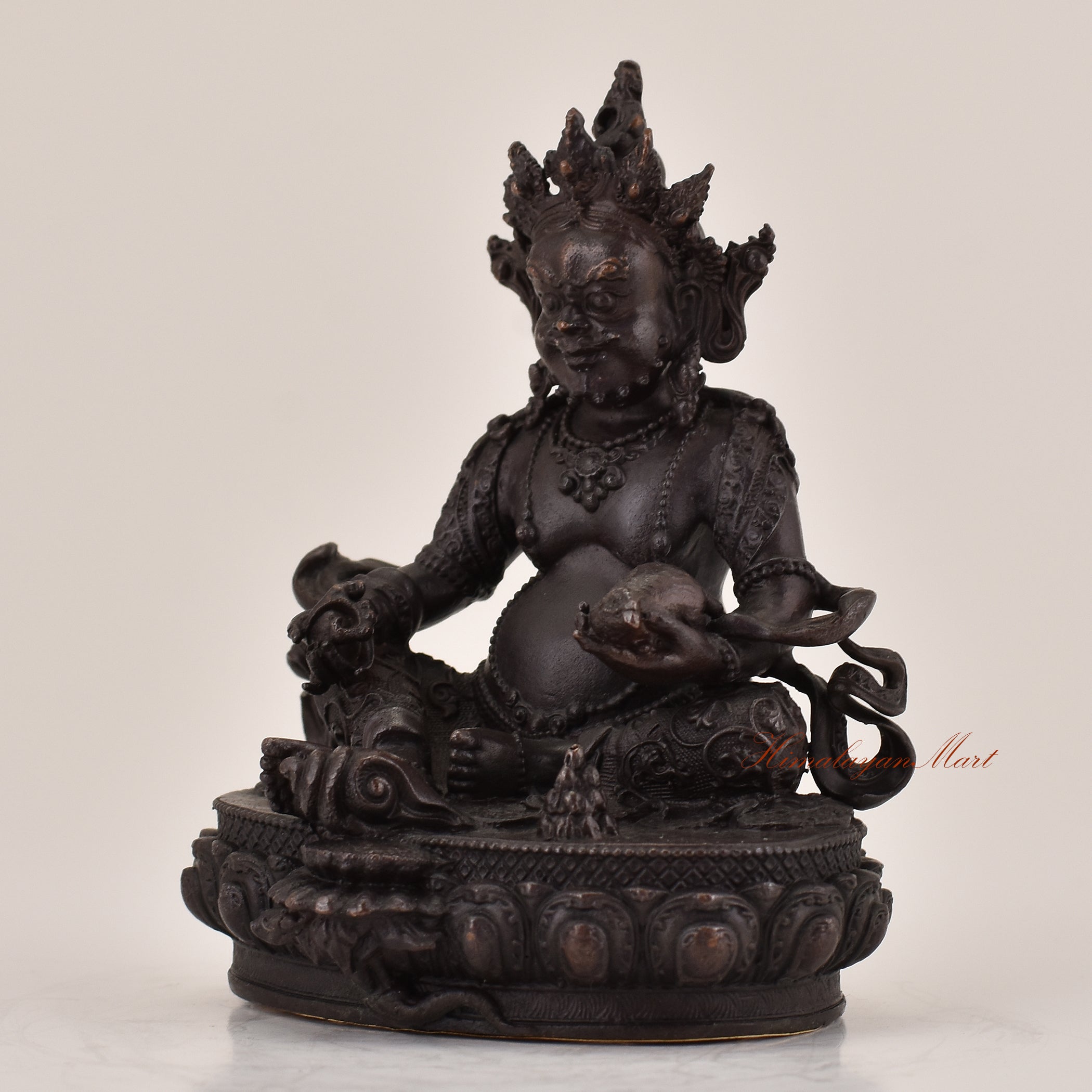 Left-side view of handcrafted Yellow Dzambhala statue for sale, Tibetan Buddhist wealth deity altar sculpture.